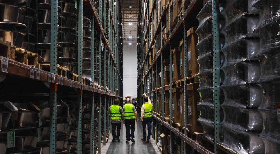 AER team walking an industrial warehouse to evaluate site safety